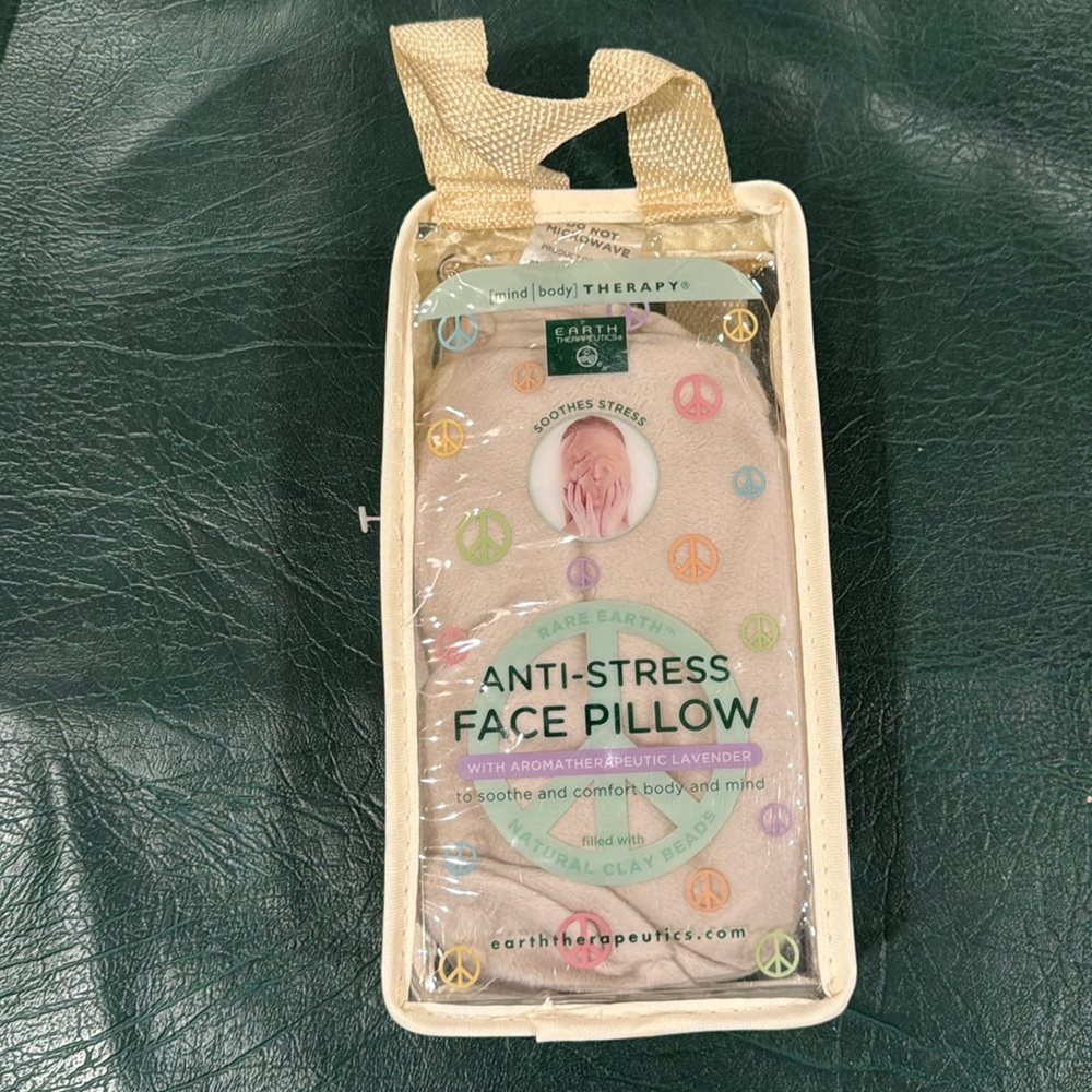 Earth therapeutics anti-stress face pillow with lavender. New in original bag.